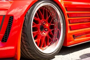 1 red-sports-tuned-car-rear-view-wheel